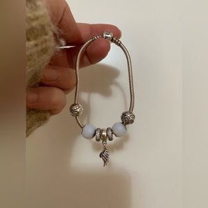Pandora bracelet with 7 charms
